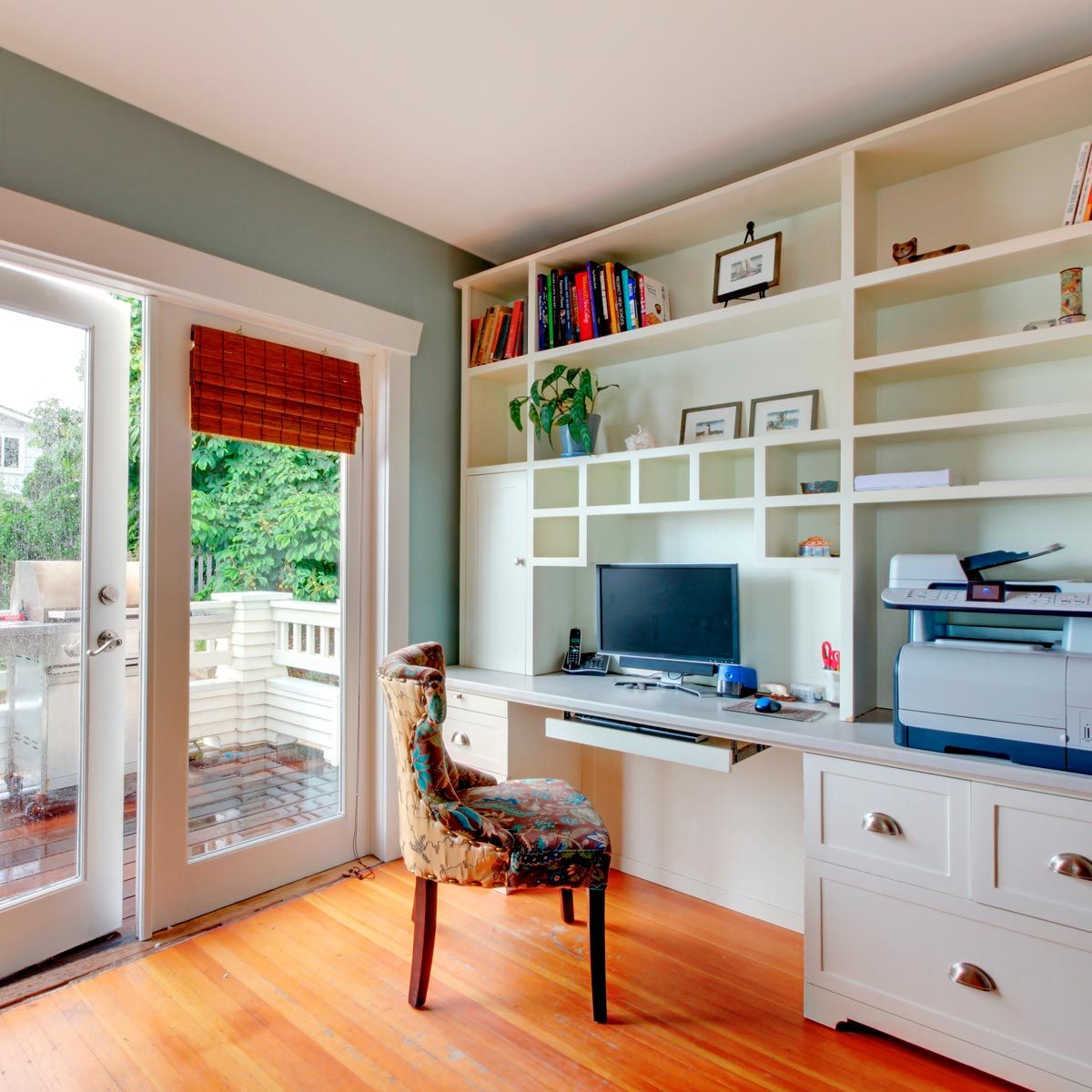 Home office design white desk and built ins